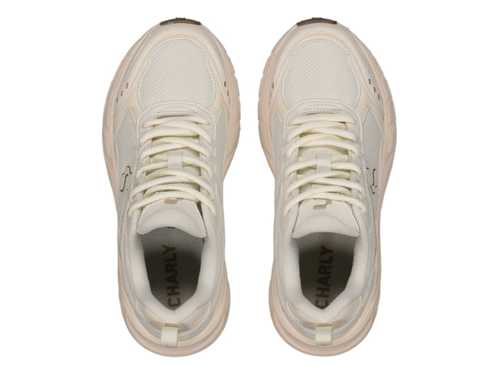 Tenis Charly color beige fashion sport con suela de plataforma gruesa y detalles sintéticos.
