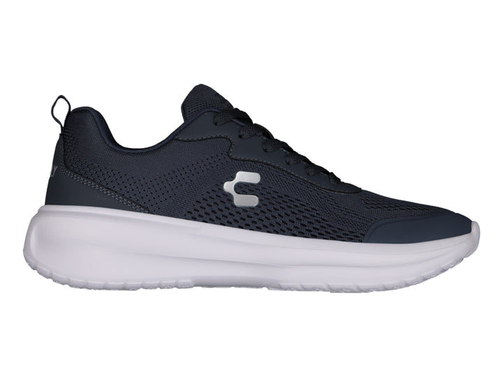 Tenis Charly casuales en color azul marino con suela blanca y detalles en malla.