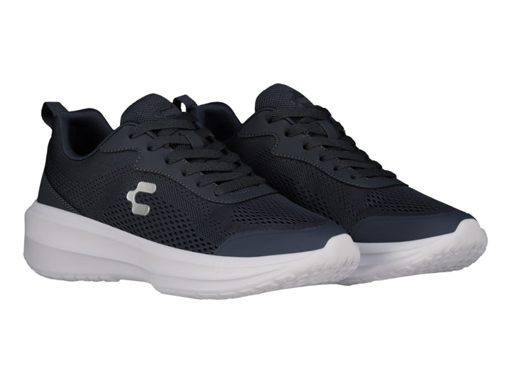 Tenis Charly casuales en color azul marino con suela blanca y detalles en malla.