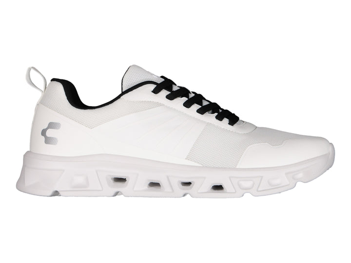 Tenis deportivos Charly color blanco con agujetas negras y suela blanca.