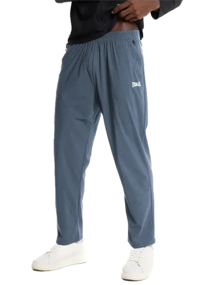 Pantalón deportivo Everlast color azul petróleo con cintura elástica y corte recto.