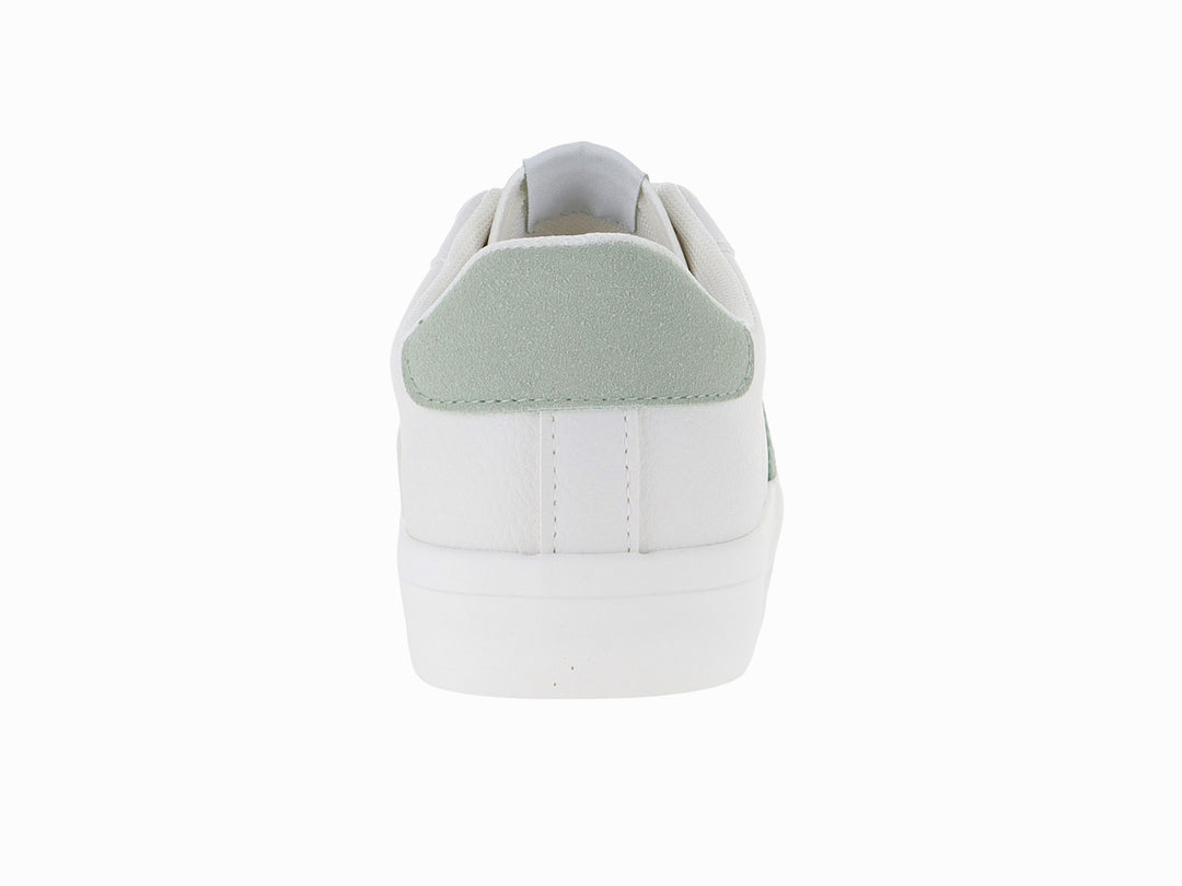 Tenis blancos de tela con detalles en color verde claro y suela blanca.
