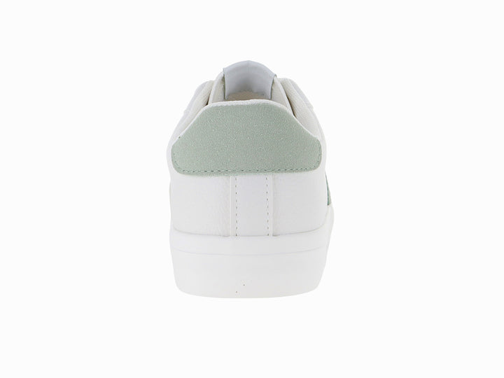 Tenis blancos de tela con detalles en color verde claro y suela blanca.