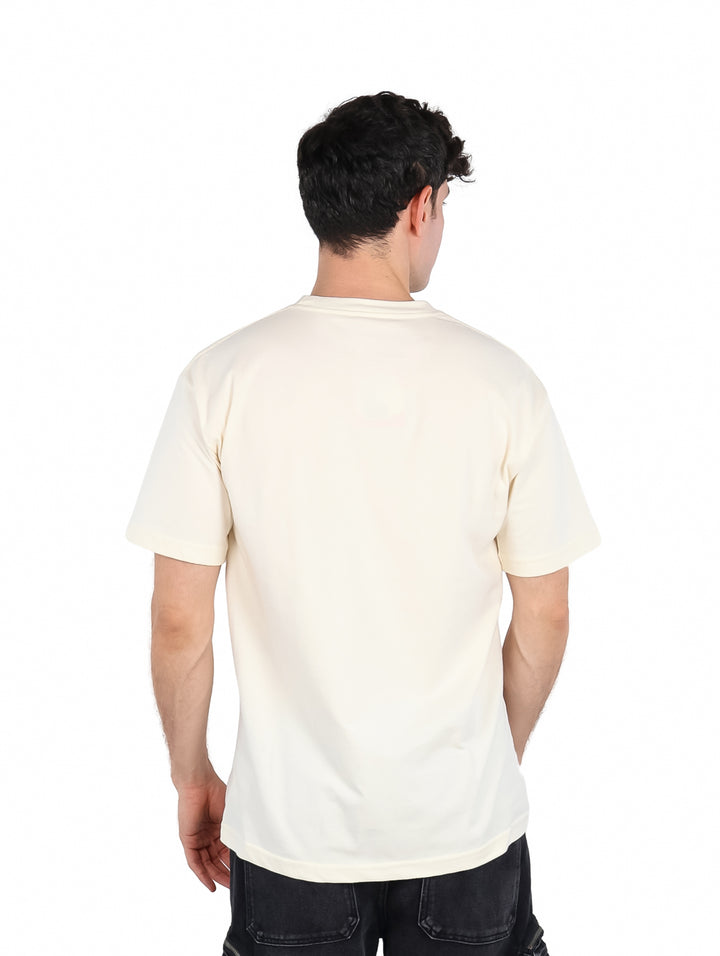 Playera oversized color crema con estampado frontal de Shenron de Dragon Ball en tonos verdes.