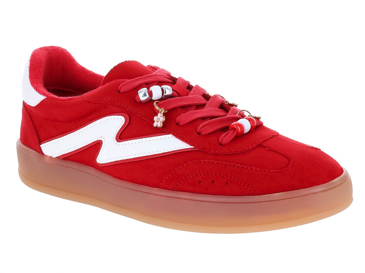 Tenis rojos de gamuza con franja blanca y suela color miel para mujer.
