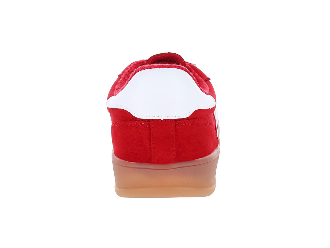 Tenis rojos de gamuza con franja blanca y suela color miel para mujer.