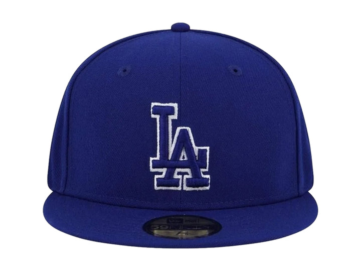 Gorra New Era azul con logo de Los Angeles Dodgers bordado en blanco y visera plana.