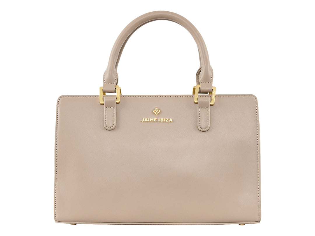Bolsa de mano color taupe de Jaime Ibiza con asa superior y detalles metálicos dorados.