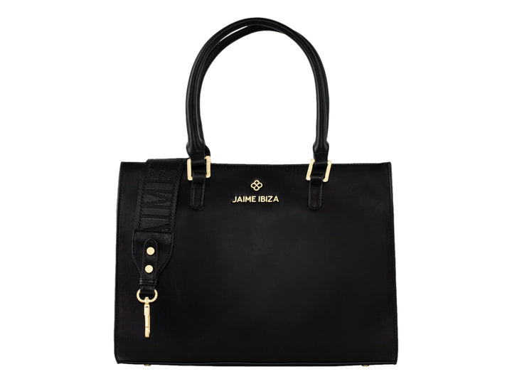 Bolsa tote color negro de Jaime Ibiza con detalles dorados y correa ajustable.