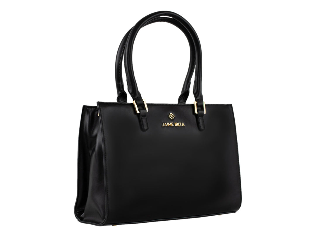 Bolsa tote color negro de Jaime Ibiza con detalles dorados y correa ajustable.