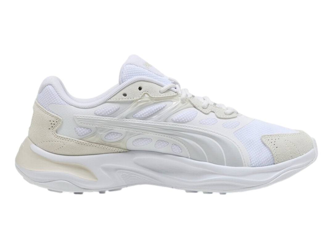 Tenis PUMA Insphere en color blanco y gris con suela robusta y diseño deportivo moderno.