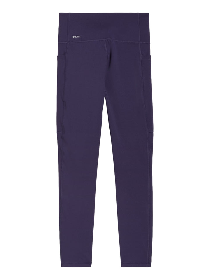 Leggings deportivos PUMA color ciruela oscuro, ajustados y de longitud 7/8.