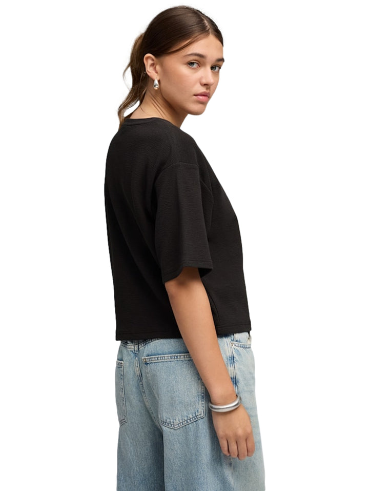Playera PUMA Ess Elevated Relaxed Negro para Mujer