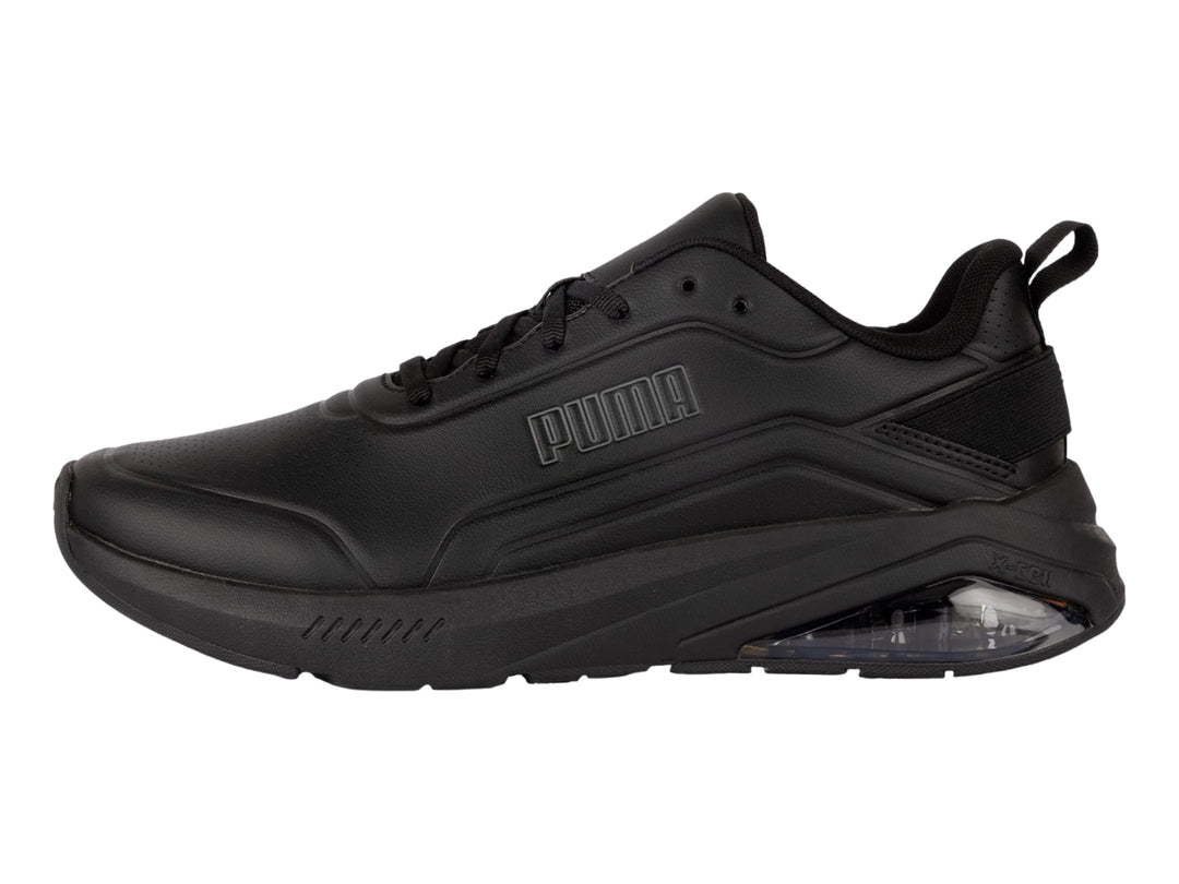 Tenis deportivos PUMA color negro con cámara de aire transparente en el talón.