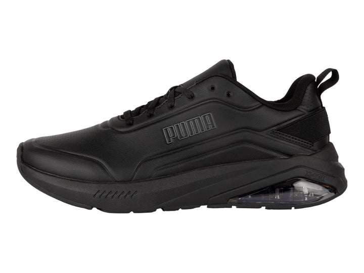 Tenis deportivos PUMA color negro con cámara de aire transparente en el talón.