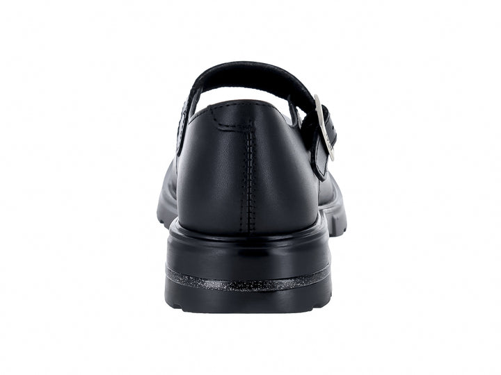 Zapato escolar negro con correa, hebilla plateada y detalle brillante en la suela.