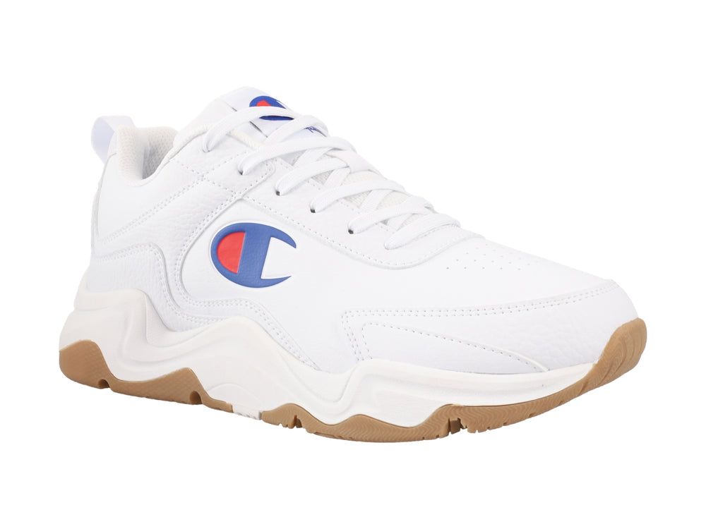 Tenis Champion blancos con suela color café y logotipo en el lateral.