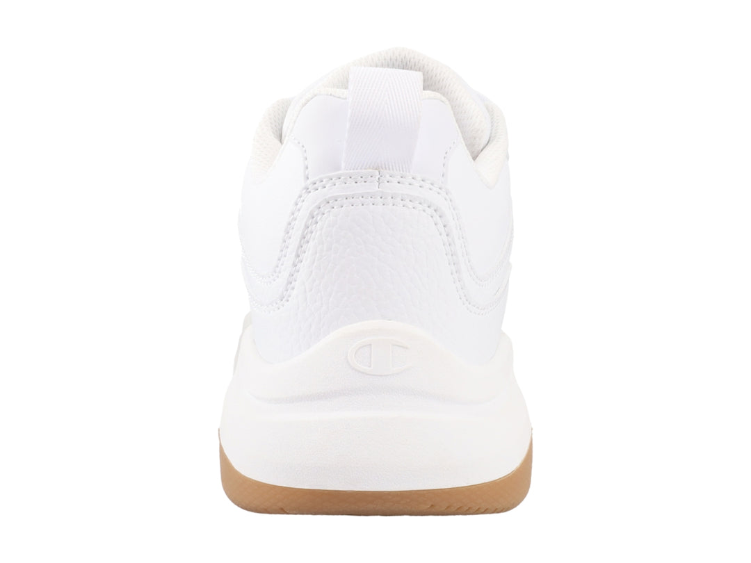 Tenis Champion blancos con suela color café y logotipo en el lateral.