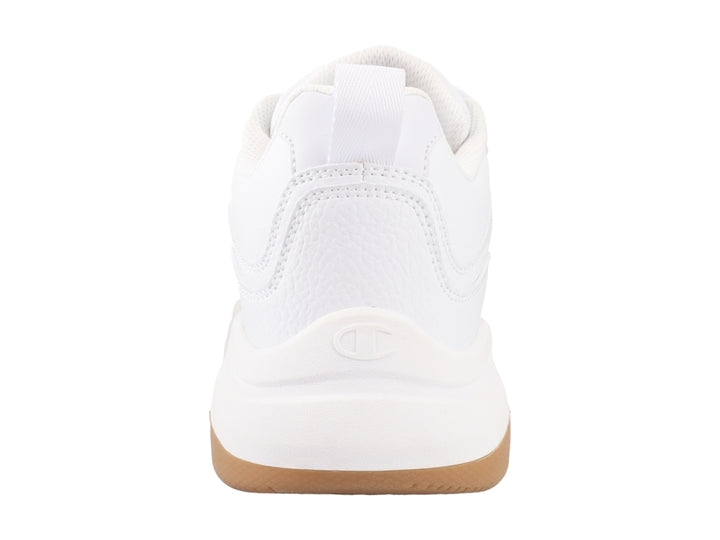 Tenis Champion blancos con suela color café y logotipo en el lateral.