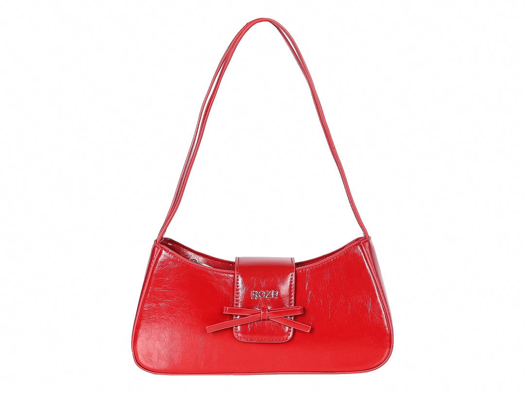 Bolso de hombro color rojo brillante con detalle de moño frontal y marca ROZE.