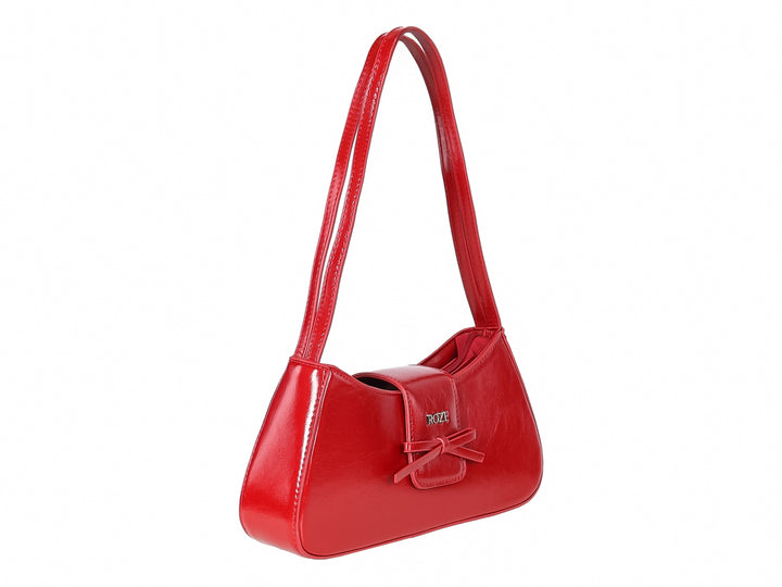 Bolso de hombro color rojo brillante con detalle de moño frontal y marca ROZE.