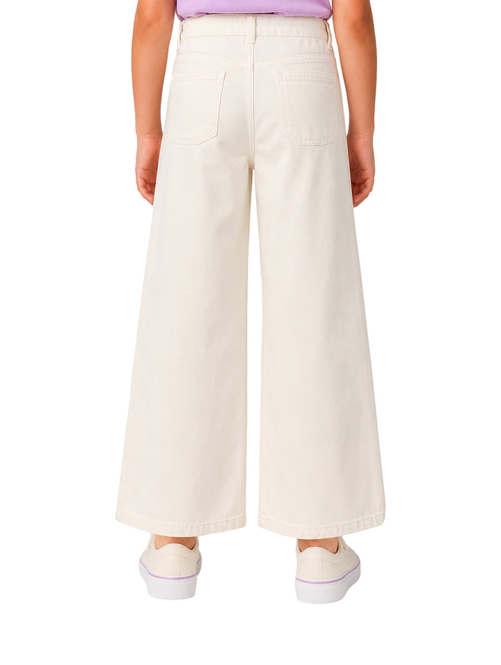 Pantalón blanco de pierna ancha para niña marca Zippy.