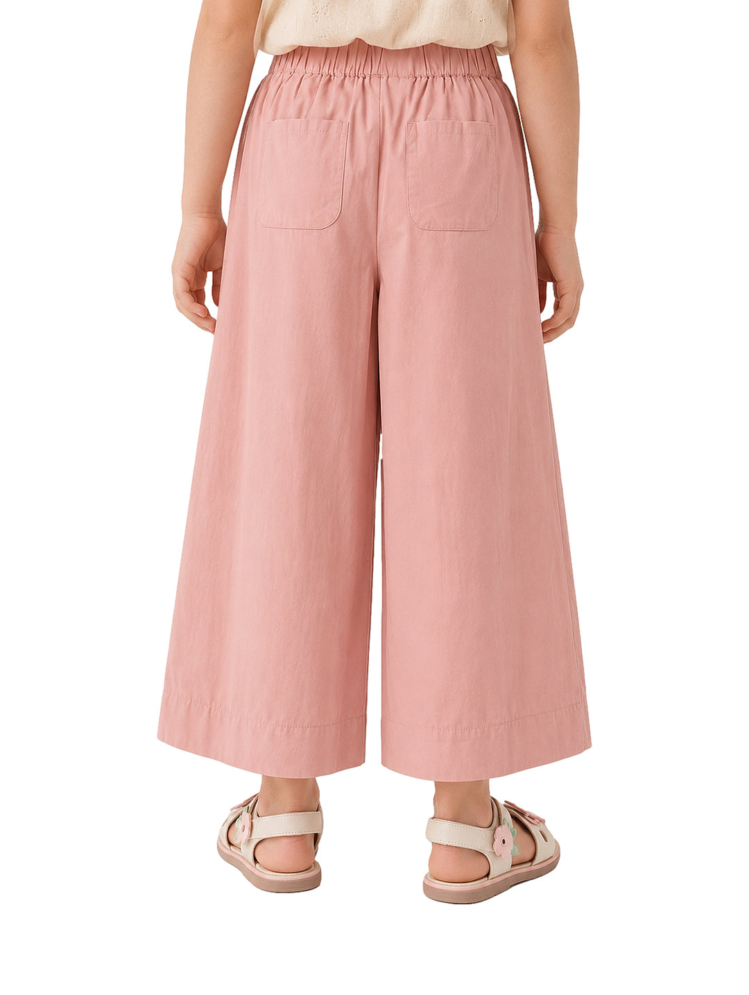 Pantalones de pierna ancha en color rosa claro para niña.
