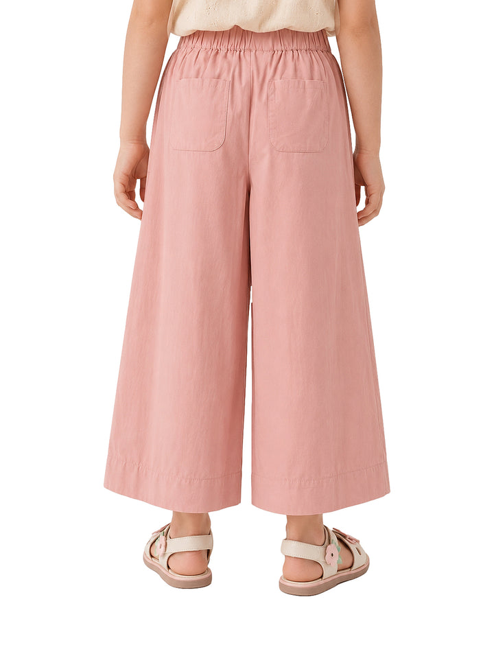 Pantalones de pierna ancha en color rosa claro para niña.