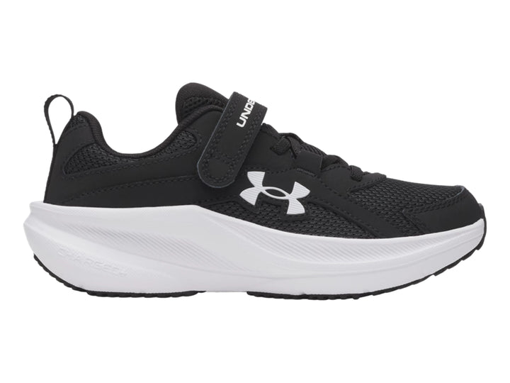 Tenis deportivos Under Armour para Niño en color negro con suela blanca y correa de velcro.