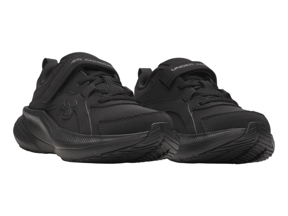 Tenis deportivos Under Armour color negro con correa de ajuste y suela Charged.