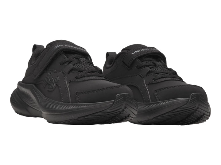 Tenis deportivos Under Armour color negro con correa de ajuste y suela Charged.
