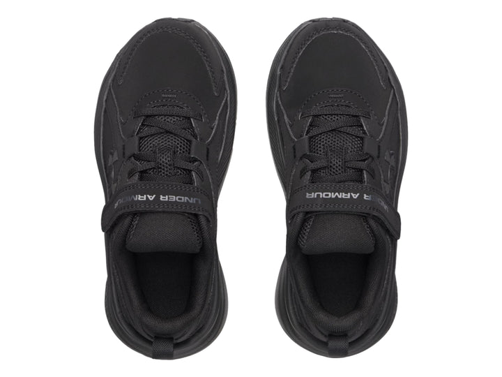 Tenis deportivos Under Armour color negro con correa de ajuste y suela Charged.
