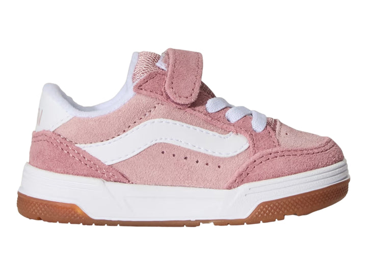 Tenis infantiles Vans color rosa con suela blanca y cierre de velcro.