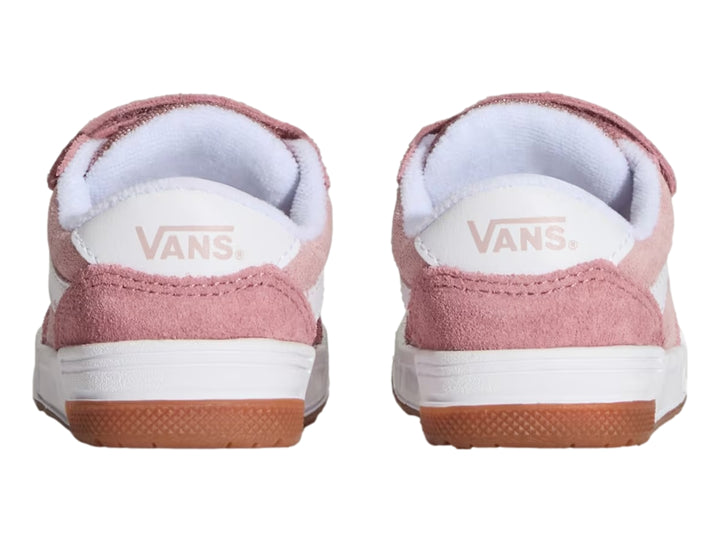 Tenis infantiles Vans color rosa con suela blanca y cierre de velcro.