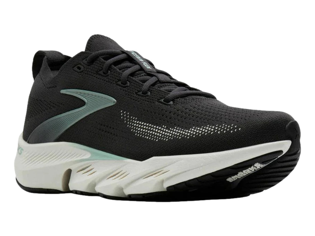 Tenis deportivos Brooks Glycerin Flex en color negro con suela blanca y detalles metálicos laterales.