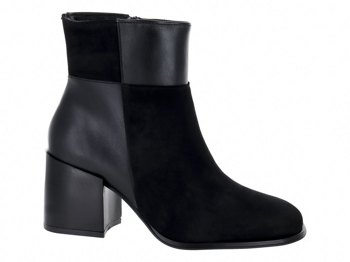 Botines negros de marca Gino Cherruti con tacón cuadrado y combinación de texturas lisas y mate.