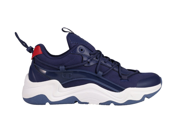 Tenis deportivos Champion color azul marino con suela blanca y detalle rojo en el talón.