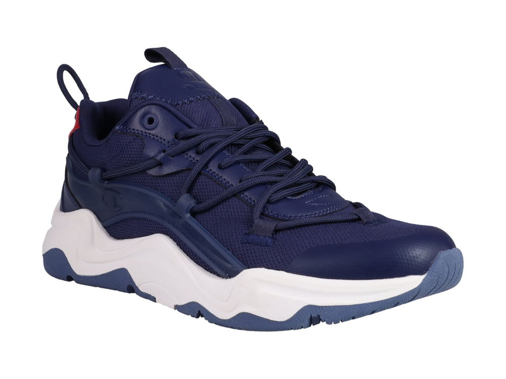 Tenis deportivos Champion color azul marino con suela blanca y detalle rojo en el talón.