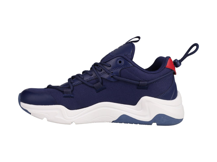 Tenis deportivos Champion color azul marino con suela blanca y detalle rojo en el talón.