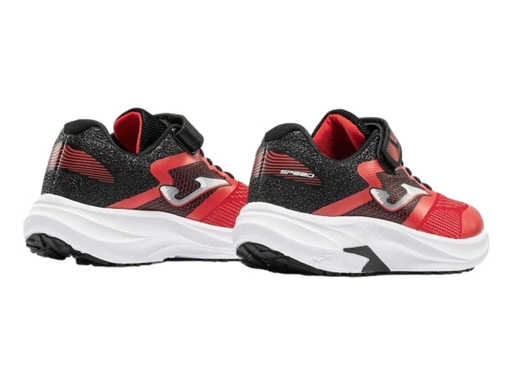 Tenis deportivos Joma color rojo y blanco con cierre de velcro y agujetas para niño.