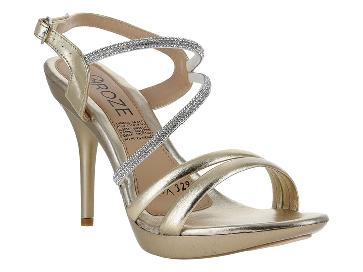 Sandalia de tacón alto color oro inglés con tiras brillantes en color plata.