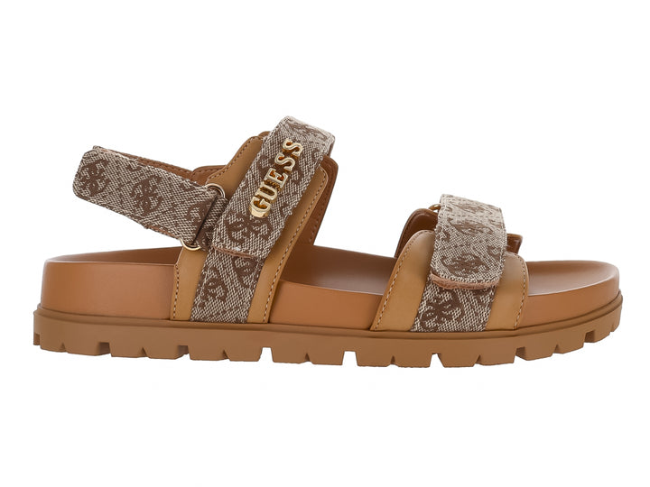 Sandalias GUESS de plataforma color beige y marrón con estampado de monograma y suela caramelo.