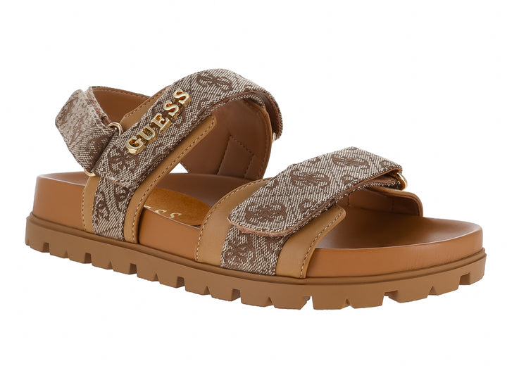 Sandalias GUESS de plataforma color beige y marrón con estampado de monograma y suela caramelo.