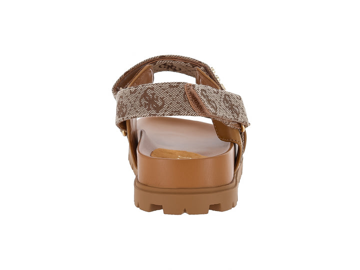 Sandalias GUESS de plataforma color beige y marrón con estampado de monograma y suela caramelo.