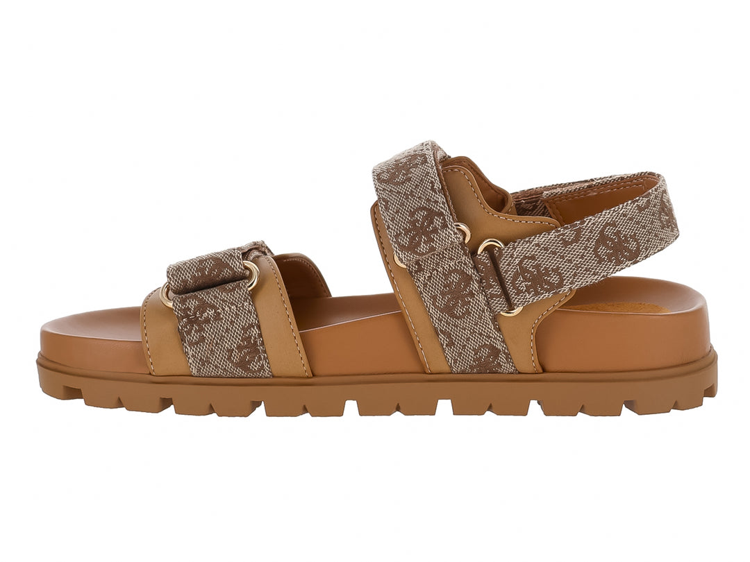 Sandalias GUESS de plataforma color beige y marrón con estampado de monograma y suela caramelo.