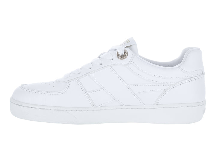 Tenis blancos GUESS de corte bajo con detalles dorados y cordones blancos.