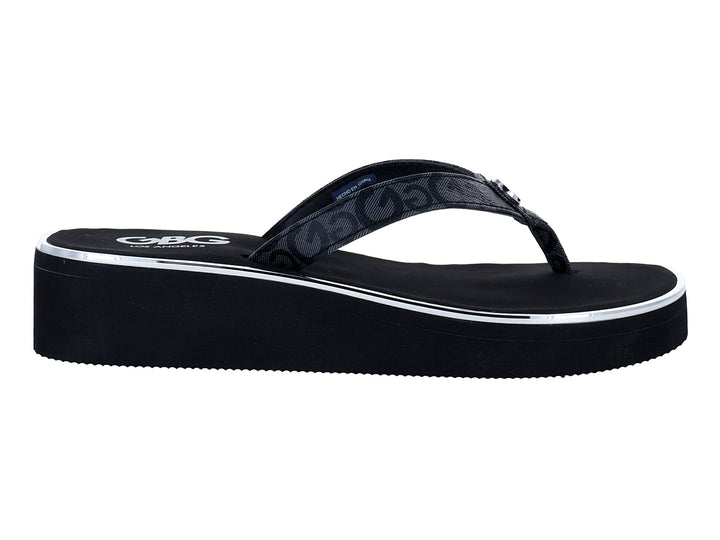 Sandalias de playa GBG color negro con plataforma y detalle lateral blanco.