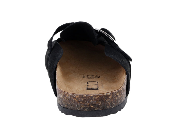 Zuecos negros de piel con hebilla metálica plateada y suela de corcho.