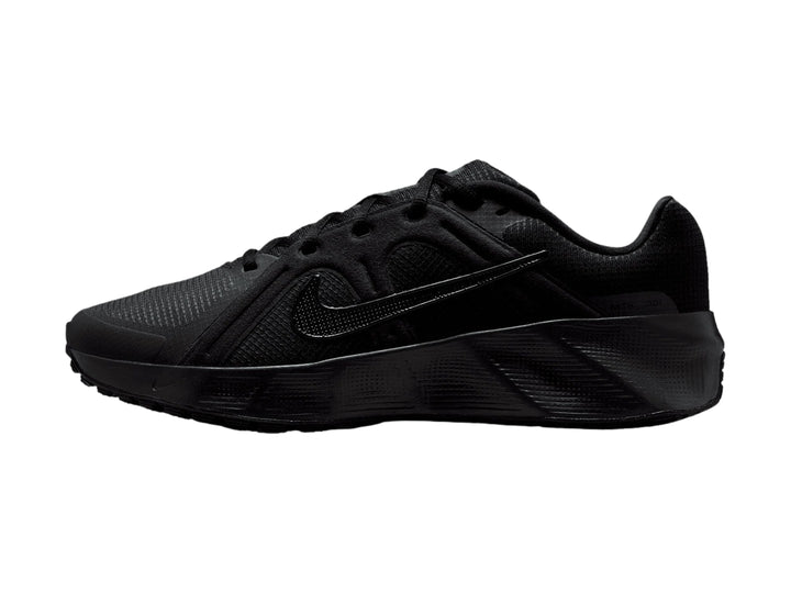 Tenis deportivos Nike City Response en color negro total, vista lateral sobre fondo blanco.