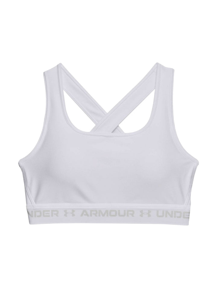 Mujer vistiendo un bra deportivo blanco de Under Armour con banda elástica en la base.
